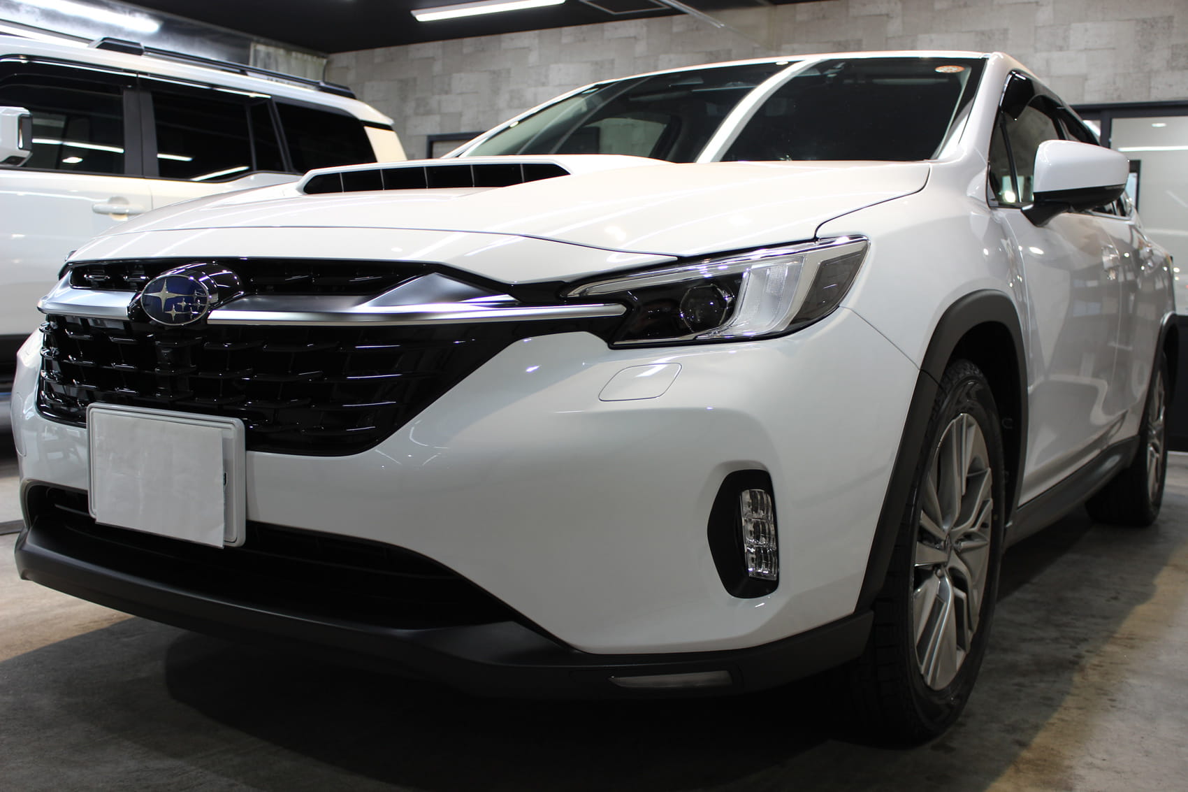 スバル レイバック セラミックホワイト フロントバンパー左